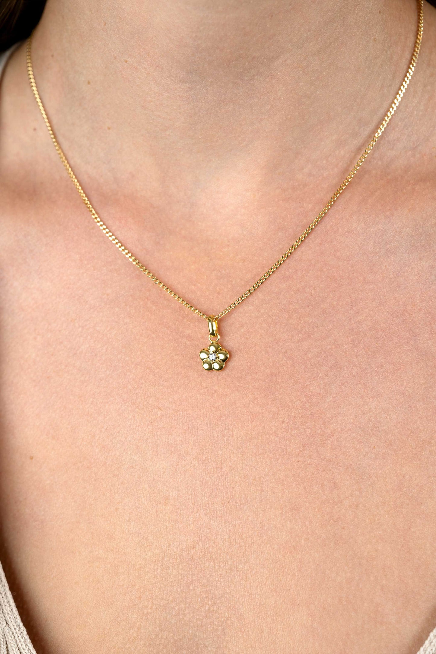 ZINZI HANGER VERGULD BLOEMVORM ZIRCONIA