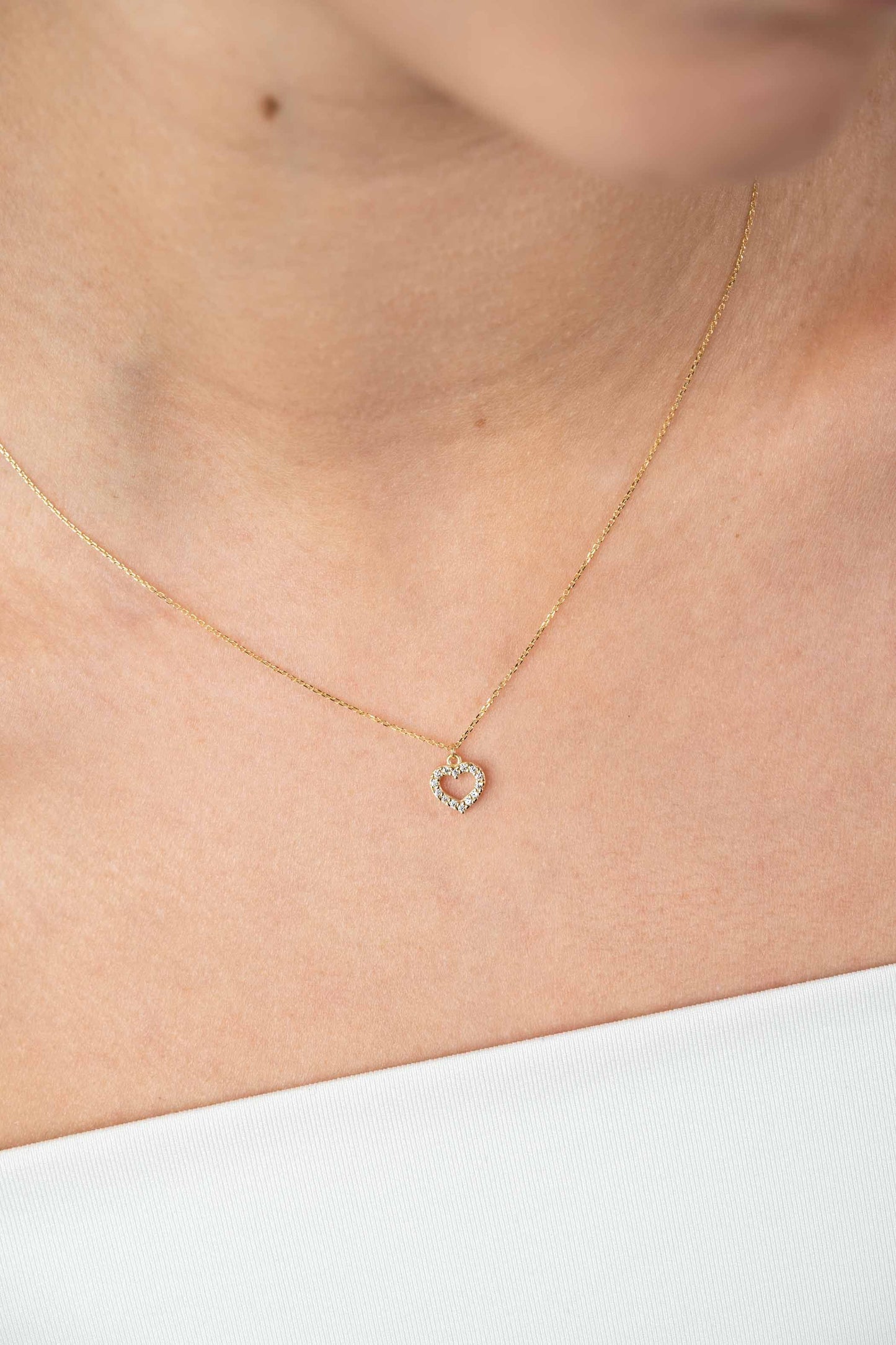 ZINZI GOLD 14KT COLLIER HANGER MET OPEN HARTJES ZIRCONIA’S 40/42CM ZGC450
