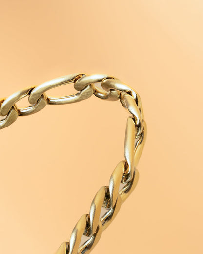 GEMINI Fortis 5mm figaro stainless steel chain with gold-plated finish